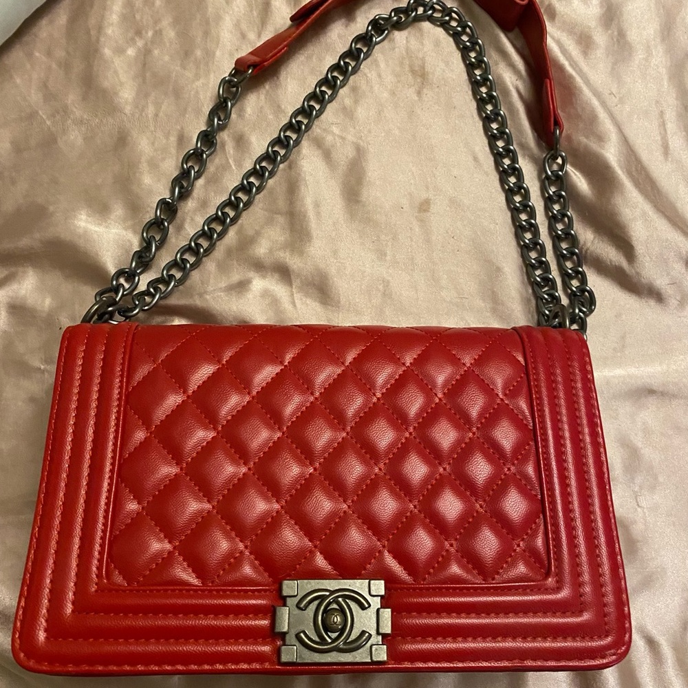 Beautiful ruby red purse not authentic